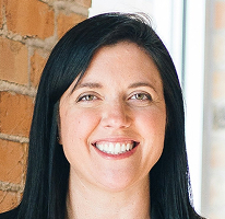 Sophie Hartwell, customer support head at a service team, portrait.